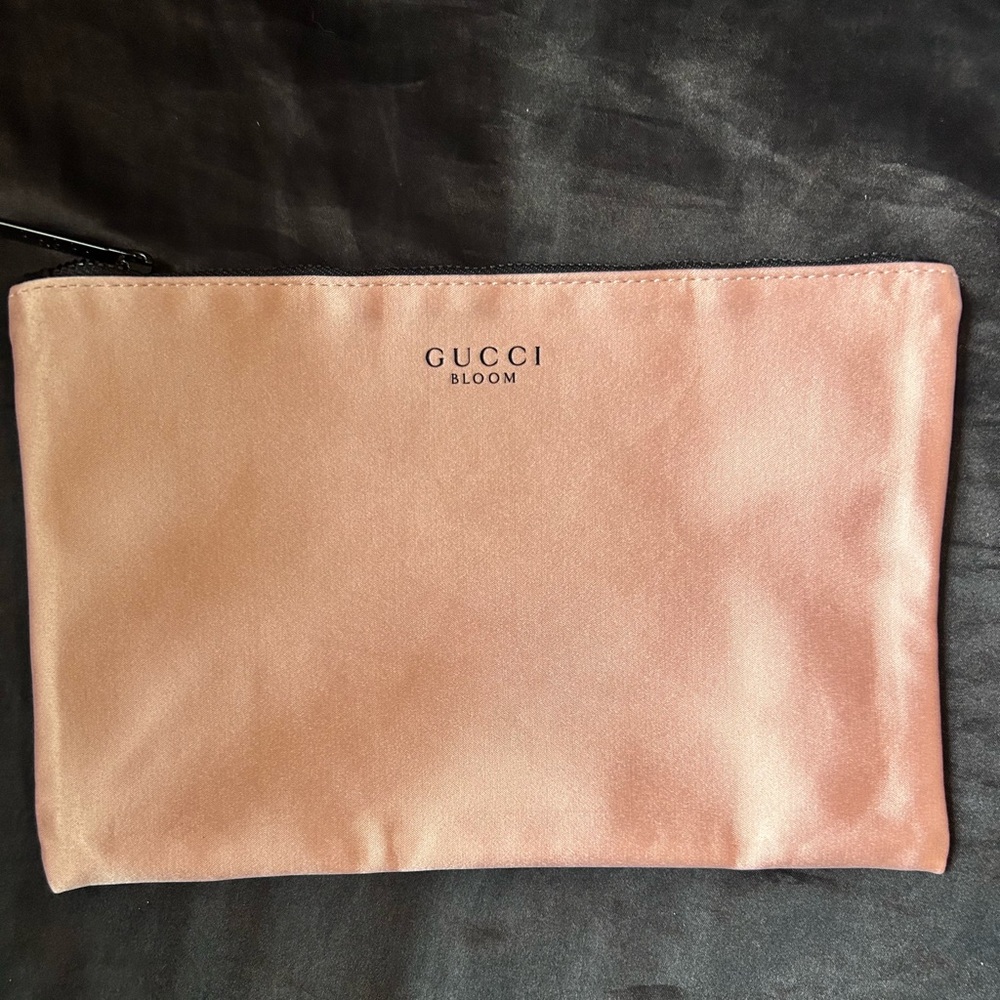 Gucci Bloom Beauty Pink Silky Cosmetic Pouch with Burgundy floral pattern.
